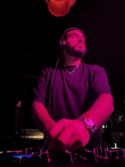 On the decks in a club in Athens for the after-party. The lighting was on point, creating an intense party atmosphere.
