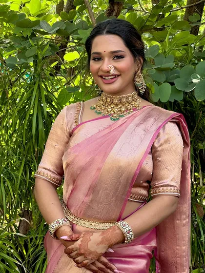 A classic pose showing off Isha's complete engagement look. The makeup is balanced to perfection, from her defined brows to her subtle smile.