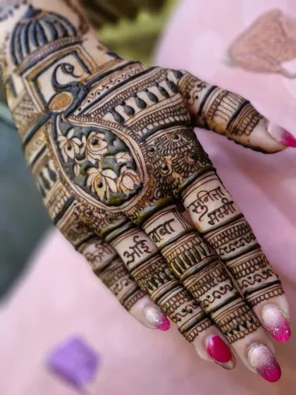 A close-up showing how I incorporate the names of important family members like 'Aai Baba' (Mom Dad) and 'Sunita Mummy' in beautiful Devanagari script.