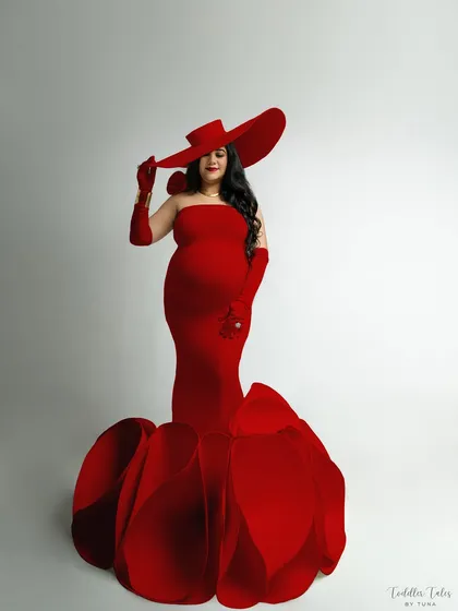 This is more than a dress; it's a statement. For the mother who is bold, powerful, and unapologetically glamorous, I create portraits that are pure art. This is your moment to embrace your inner queen, and I am here to capture every bit of that fire.