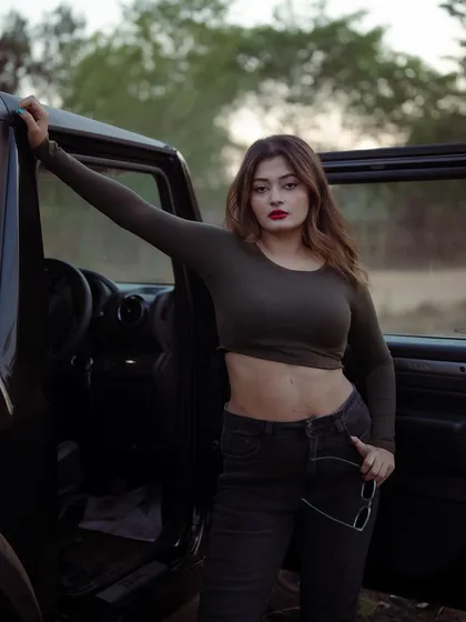 A duplicate of image 87, this portrait with a Thar jeep adds a rugged and adventurous element to a fashion shoot.