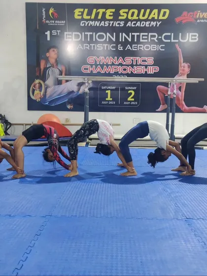 A "bridge train" with our girl's team. This is a fun way to work on back flexibility and endurance as a group.