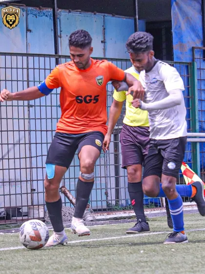 Our captain demonstrating strength and composure on the ball during a competitive MFA First Division match.