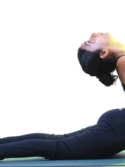 Opening the heart in Urdhva Mukha Svanasana (Upward-Facing Dog). This pose is a powerful reminder to be fully present in the now, as life is only ever happening in this moment.