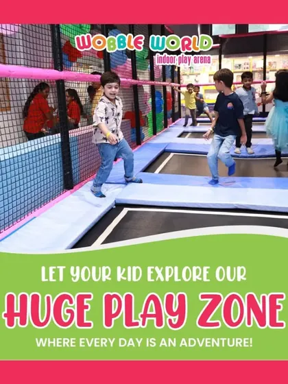 Kids bouncing with joy in our dedicated trampoline zone. This safe, netted area lets them jump and explore freely.