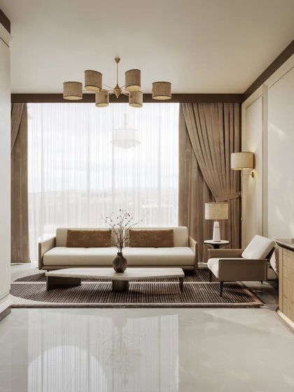 This series of renders explores a living room defined by modern elegance and warm minimalism. We show the space from multiple angles, detailing the custom wall paneling, the sleek furniture, and the flow of natural light.