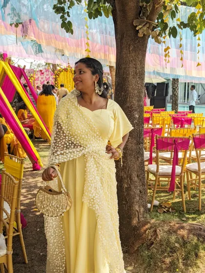 Here is another lightweight and elegant outfit for a Haldi function. The yellow color and delicate embroidery make it a beautiful choice for a daytime wedding event.
