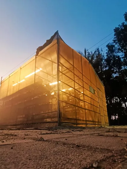 One of our hydroponic pods glowing at sunset. These controlled environments are the heart of our operation, allowing us to grow fresh produce reliably, no matter the season.
