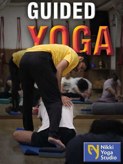 My goal is to provide guided yoga that helps you align your body and mind. This image captures a moment of hands-on adjustment, which is central to my teaching philosophy.