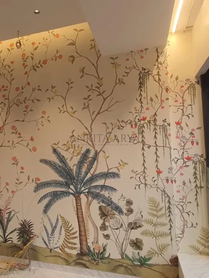 Another view of the spring garden mural during installation, highlighting the detailed palm trees and climbing floral vines.