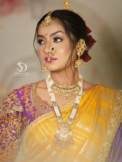 A close up showcasing the flawless base and soft eye makeup of this Marathi bridal look.