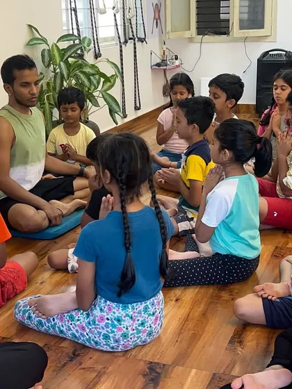 Here I am with my class of young yogis. Even the most energetic children learn to sit still. It requires being tough, soft, and rough at the right times. If you believe your children have it in them, this is the path for them.