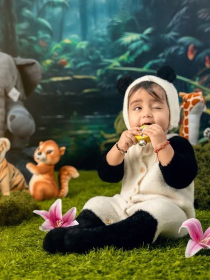 A cheeky wink from our little panda in the jungle, adding a touch of personality and fun to the shoot.