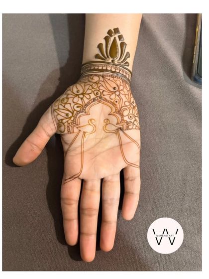 A graceful design for my sister, with a peacock arch and a lotus cuff. This shows the design with just the outline.