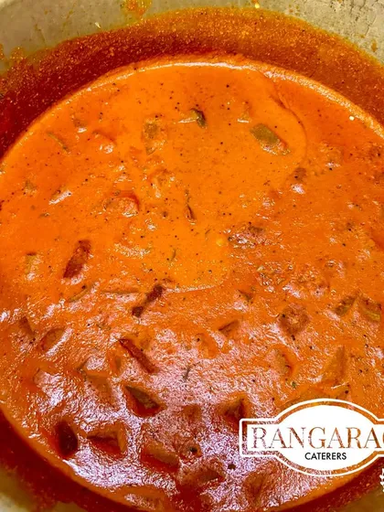 A close-up of our signature Mangaluru Southekayi Huli, a flavourful cucumber curry from the coastal region of Karnataka. This dish is a perfect example of the authentic regional recipes we specialize in.