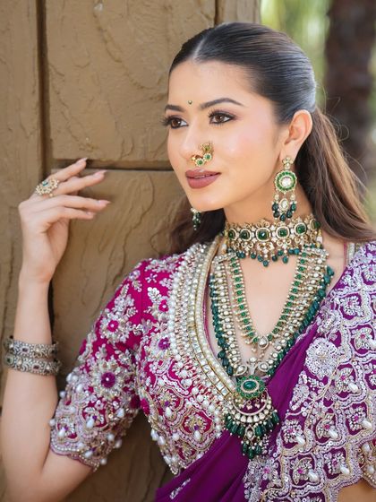 The perfect profile. This shot highlights the traditional nath and the soft, glowing skin, showcasing a blend of heritage and modern bridal beauty.