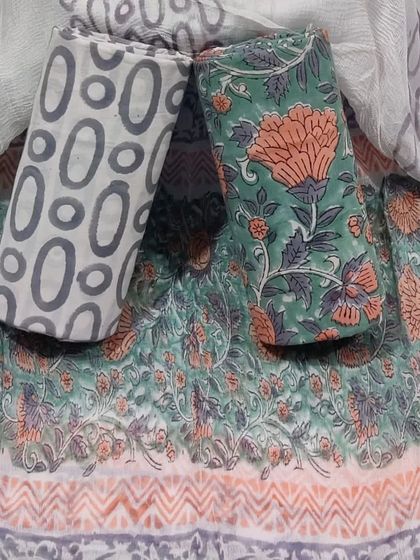 This subtle and sophisticated green and grey block print set is a great choice for office or daily wear.