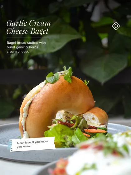 A cult fave. If you know, you know. Our Garlic Cream Cheese Bagel is generously stuffed with a house-made spread of burnt garlic and herbs.