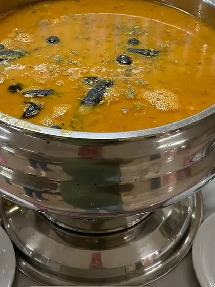A hearty Dal Tadka, providing a wholesome meal for the fire brigade officers.