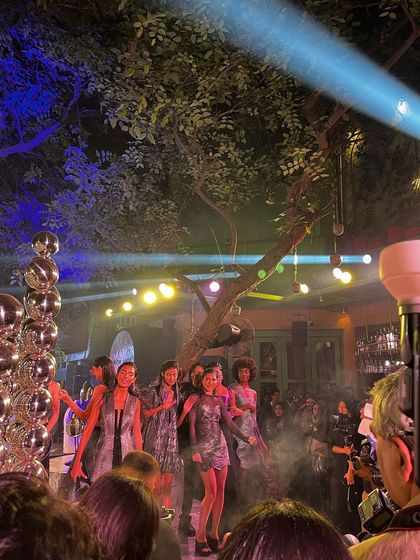 The grand finale of the Rimzim Dadu show, with models taking their final walk. The energy of a live fashion event is unmatched.