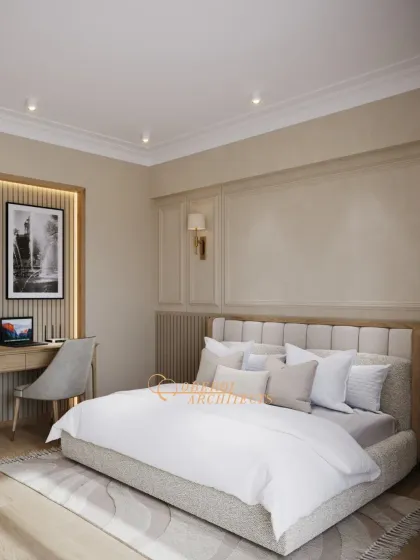 A bedroom design that embraces soft tones and clean lines, with an integrated workspace featuring a backlit fluted panel and monochrome art.