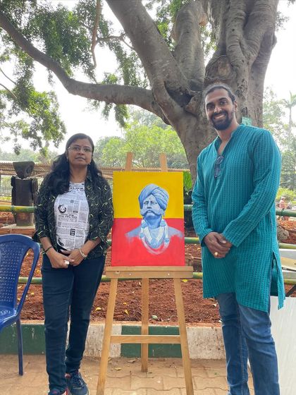 Posing with my finished portrait of Nada Prabhu Kempegowda at the Art in the Park event. It's always a great experience to paint live and interact with people who are passionate about art and local history.