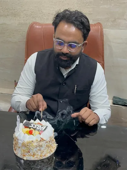 The birthday cake cutting. We make sure to celebrate the people who make our firm what it is.