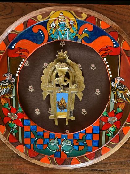 A full view of the hand-painted Ketu frame. The artwork incorporates symbols like the flag, the vulture, and multi-colored geometry, all associated with this planet that rules endings and spiritual liberation.