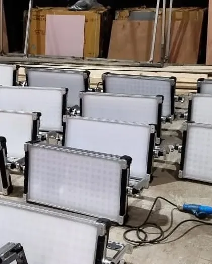 A collection of Arri SkyPanel S60-C units being prepped for a shoot. These panels are an industry workhorse, known for their beautiful color rendering and soft output.