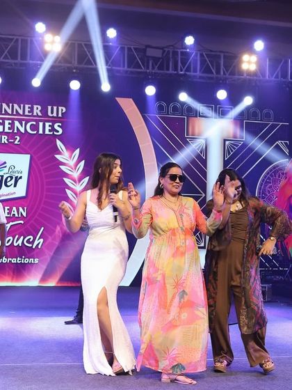 More fun and dancing on stage with guests at the Berger Paints celebration.