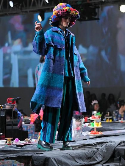 For this male model on the Lakme Fashion Week runway, the focus was on texture and shape. The oversized, colorful woolen hat was the centerpiece, so I kept the hair underneath styled for a natural look.
