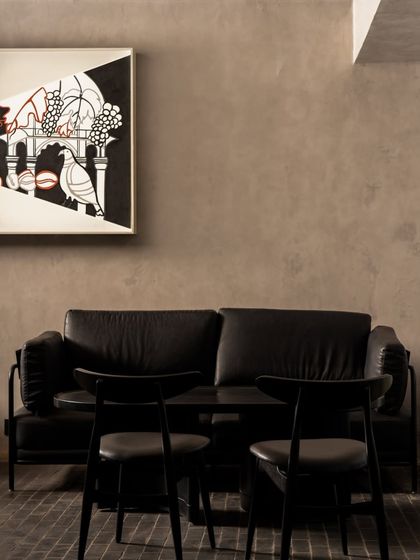 A detail of the coffee shop artwork, showing elements of harvesting and roasting. The piece is a testament to our belief that even commercial art should be filled with memory, movement, and meaning.