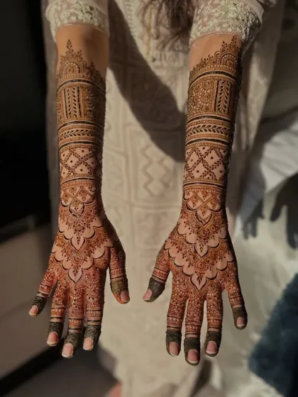 A full view of the intricate bridal design, showing the beautiful symmetry and detail.