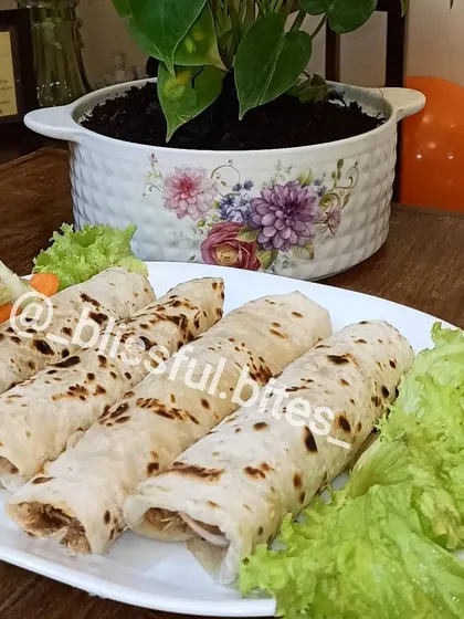 My Smokey Chicken Rolls are filled with flavorful, tender chicken and wrapped in a soft, homemade flatbread. They make for a satisfying and wholesome snack any time of day.