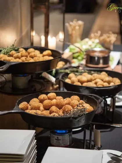 Our cheese corn balls are a party favorite, fried until golden and crispy on the outside with a gooey, cheesy center. We serve them hot right from the pan to ensure the perfect texture and taste.