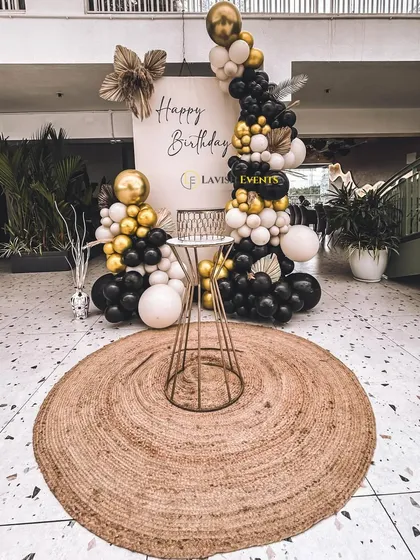 Another view of the chic black, white, and gold decor, perfect for any stylish event.