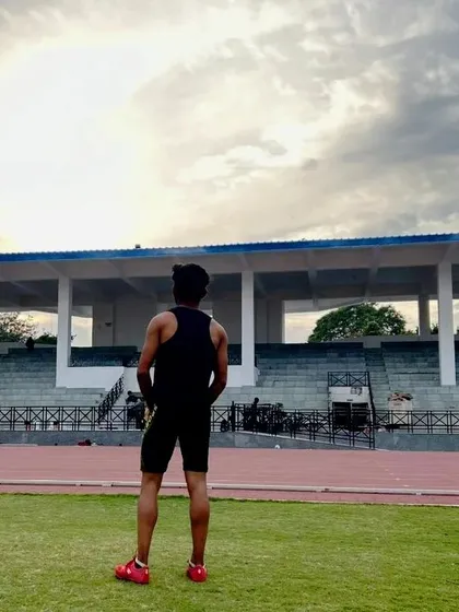 Taking a moment to look over the track at the stadium. This is my field of work, where I help athletes turn their potential into performance.