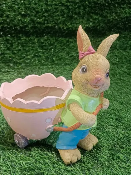 The bunny planter is also available in pink, shown here empty and ready for you to pot your favorite plant.