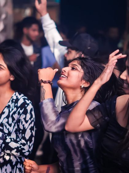 Friends enjoying the music and the vibe at our weekly 'Mondaze' event.