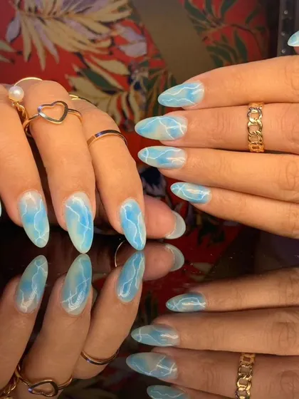 Another angle of the stunning blue marble effect nails.