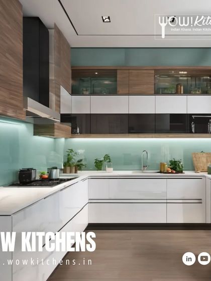 A beautiful U-shaped kitchen that masterfully blends textures. It features glossy white lower cabinets, wood-grain upper cabinets, and a refreshing light blue glass backsplash.