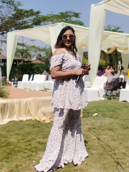 A full-length shot of my outfit for a sunny, outdoor engagement party. My style is always elegant yet comfortable enough to move around and interact with everyone.