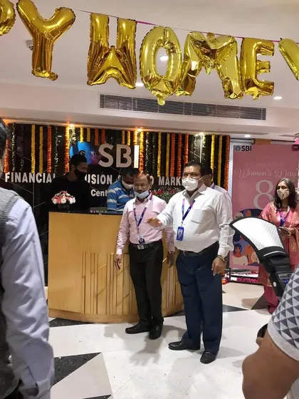 Celebrating Women's Day at an SBI branch. We can provide catering and simple decor for office celebrations, making employees feel appreciated.