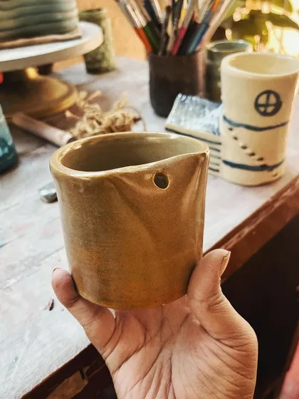 This student took to pottery like a fish to water. In her advanced course, she created this massive, beautiful planter, a real achievement that shows her dedication and skill. I am so proud of her.