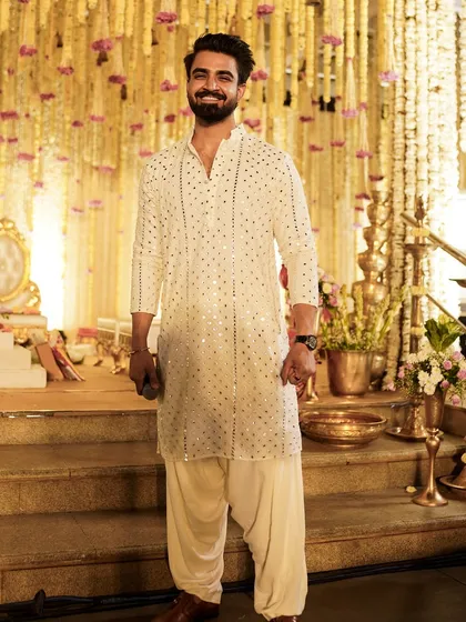 A smile before the main event begins. Confidence and a positive attitude are key to setting the right tone for the evening.