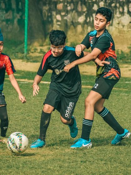 Players from different teams battle for control in the midfield, a key aspect of any football match.