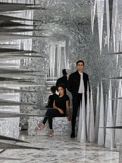 A portrait of us within the 'Palate Cleanser'. This installation embodies our love for creating spaces that challenge perception and tell a story through form, material, and sensory engagement.