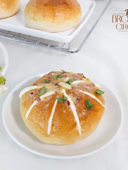 While we're famous for our sweets, our savoury bakes are just as crafted with care. Our Korean Cream Cheese Bun is a customer favorite, offering a perfect blend of sweet and savoury with its garlic butter and rich cream cheese filling.