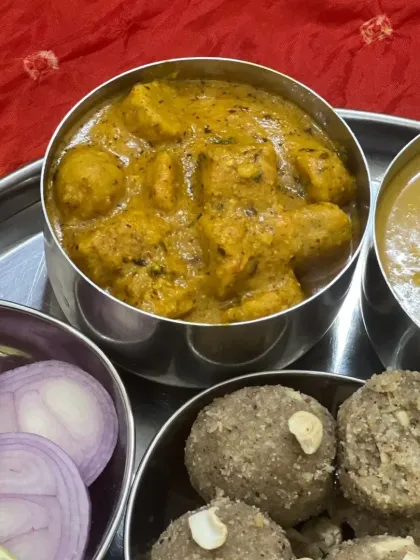 A close-up of the rich and flavorful Masala Gatta curry, a staple in our Rajasthani menu.