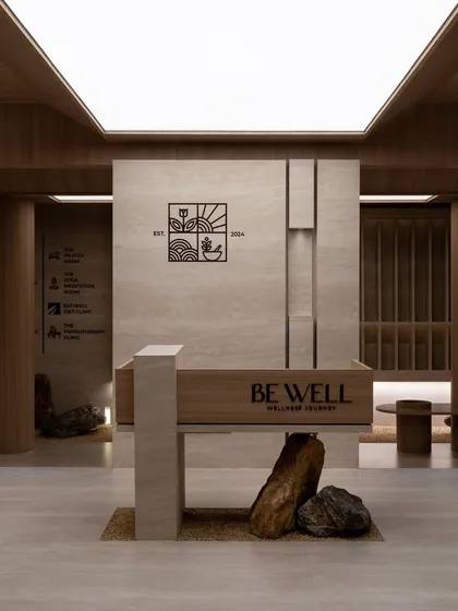 The reception of the Be Well wellness center in Amritsar, where the narrative begins. Here, I used a language of restraint, combining natural stone, warm wood, and diffused light to establish an immediate atmosphere of calm and clarity.